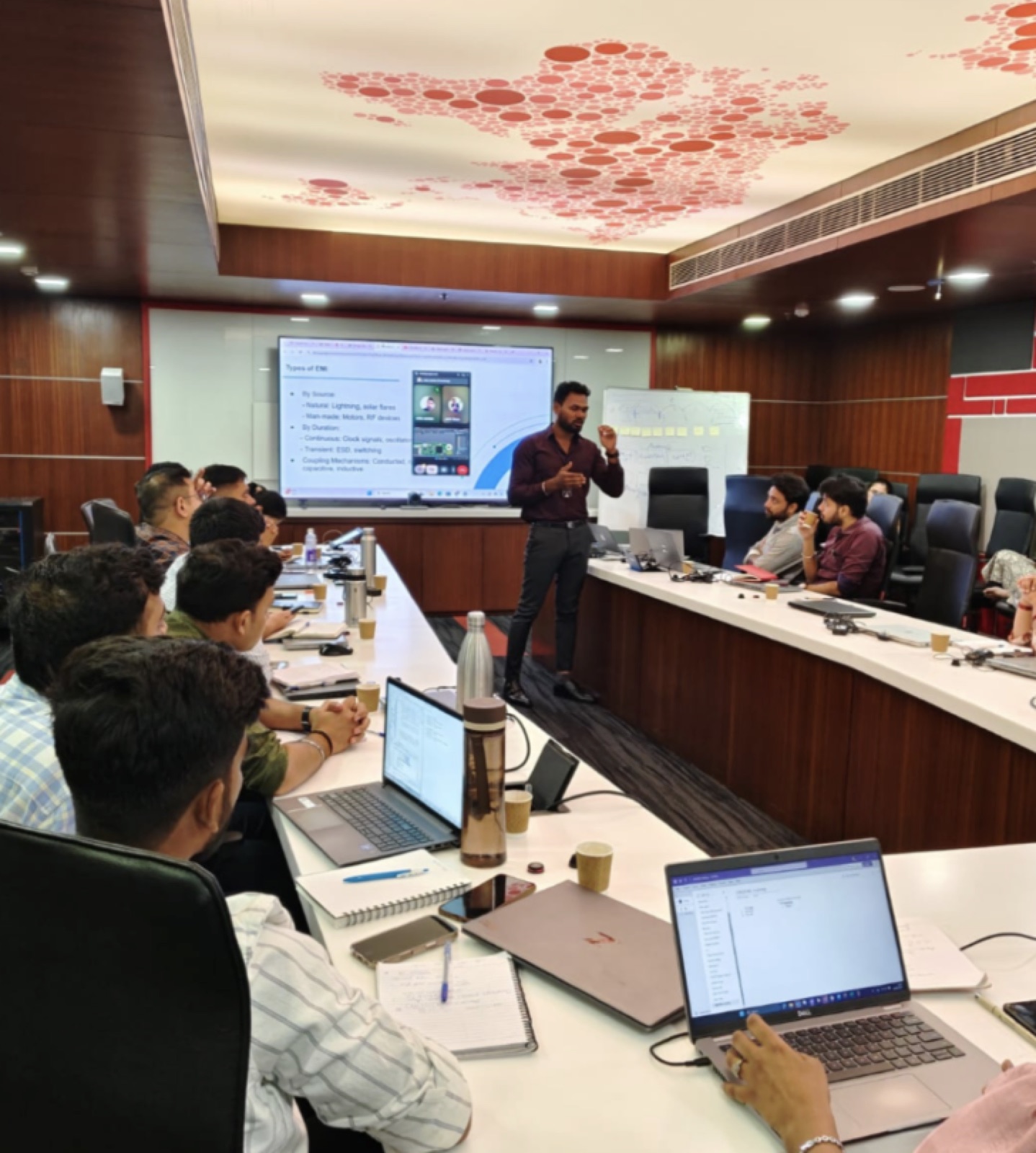 Engineers learning PCB design fundamentals during a hands-on session